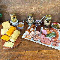 Thumbnail for This assortment is a collection of some of our favorites.  Includes:  12 oz. of Smoked Turkey Breast Filet 16 oz. of Pork Tenderloin 12 oz. Cheddar Jalapeno Summer Sausage 8 oz. Dietert Family Pork & Beef Ring Sausage 16 oz. Jar of Sweet Fire Pickles 8 oz. Jar of Peach Jalapeno Preserves 8 oz. Jar of Honey Dijon Mustard 8 oz. Smoked Cheddar Cheese 8 oz. Smoked Pepper Jack Cheese 10 oz. Smoked Baby Swiss Cheese ﻿Item #30E