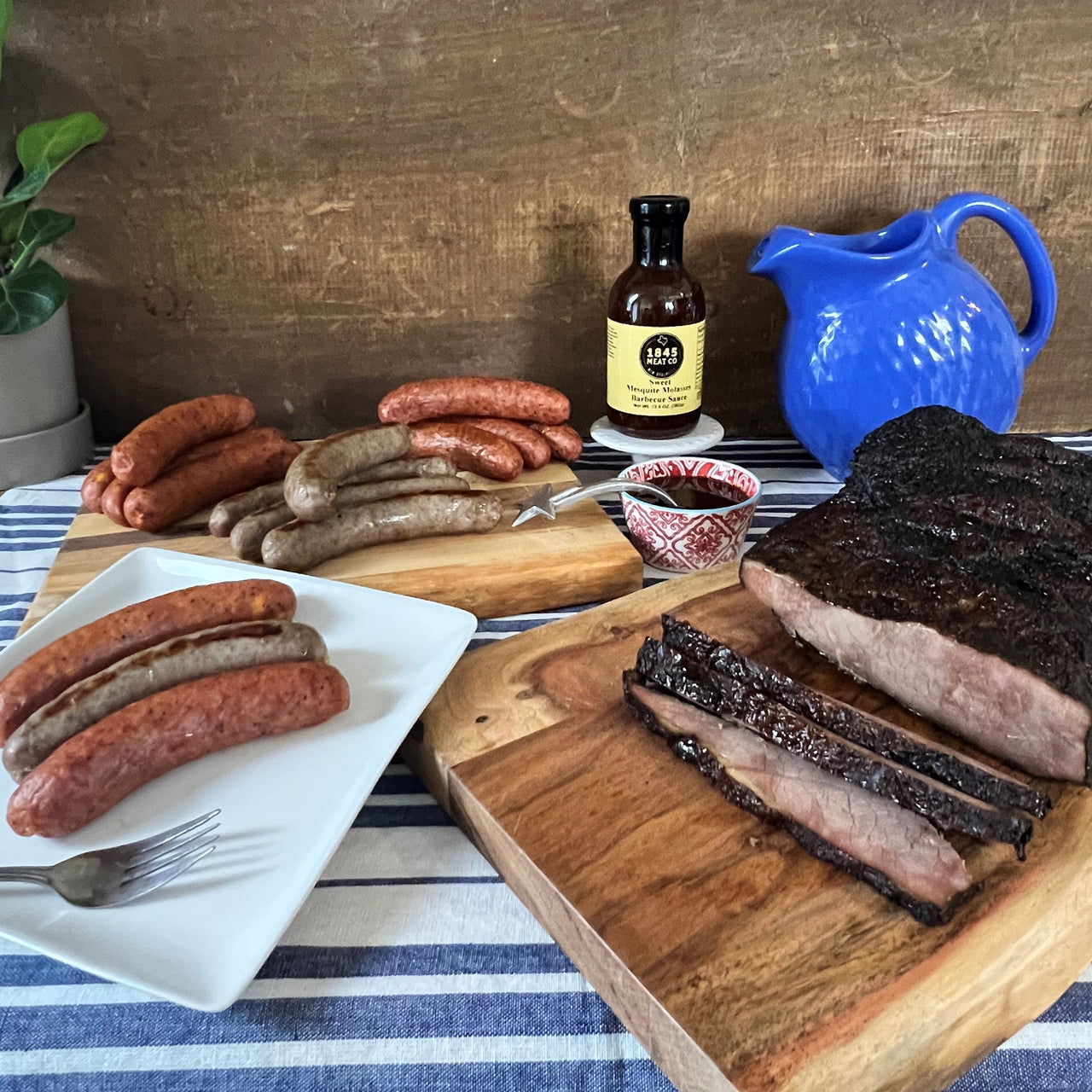 An assortment of items that will make your next gathering or picnic a success.  Includes:  4 - 6 lbs. Smoked Beef Brisket 16 oz. Smoked Pork & Beef Sausage 16 oz. Bratwurst 16 oz. Smoked Cheddar Sausage 13.5 oz. Jar of Sweet Molasses BBQ Sauce ﻿Item #80E