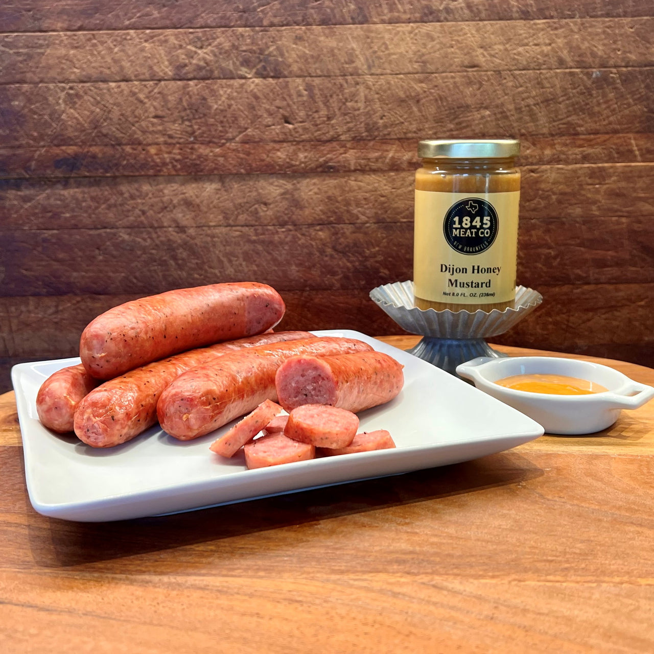 A classic Dijon Honey Mustard that is a perfect complement to our smoked meats and cheeses.  Also great on your sandwich or as a dressing on your next salad!