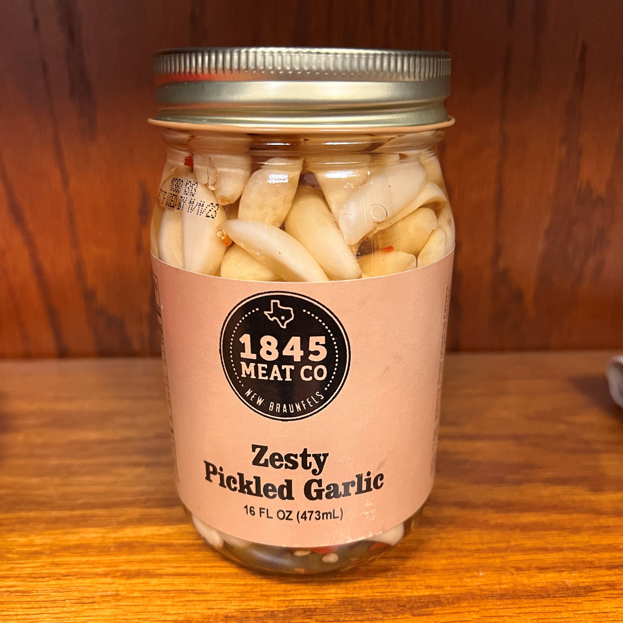 ﻿This Pickled Garlic is combined with Jalapeno Peppers and is perfect on a meat & cheese board or as a zesty snack.