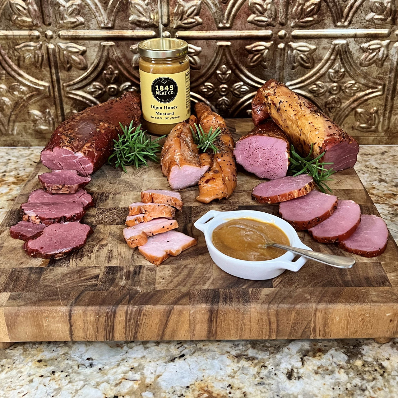 A perfect combination of all 3 of our Smoked Tenderloins that are the perfect start to your next party or a great gift to that next person on your giftlist!  12 oz. Turkey Tenderloin 16 oz. Pork Tenderloin 16 oz. Beef Tenderloin  Item #25E